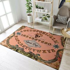 a living room with a large rug on the floor next to a chair and table