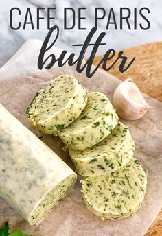 garlic bread is cut into slices and placed on a cutting board with parsley next to it