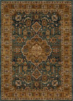 a blue and brown rug with an ornate design on the center, surrounded by other decorative elements