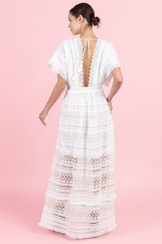 "Deep V-Neck Maxi Lace Dress with Accentuated Waist Color: White Material: 100% Poly Length: 50\" armpit down Waist: Small 28\", Medium 30\", Large 32\" Model wearing S and is 5'7\" tall ALL SALES ARE FINAL." Bohemian V-neck Dress With Scalloped Lace, White V-neck Maxi Dress With Lace Trim, Bohemian V-neck Crochet Lace Dress, Delicate Lace V-neck Dress For Brunch, Bohemian V-neck Maxi Dress With Lace Patchwork, Bohemian V-neck Dress With Crochet Trim, White Maxi Dress With Scalloped Lace V-neck, Bohemian Maxi Dress With Lace Patchwork And V-neck, V-neck Vacation Dress With Lace Sleeves