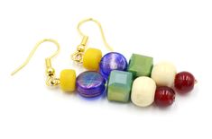 Inspired by your old art teacher, these primary colored earrings are a unique collection of unique beads just like art its a fun mixture of different elements becoming one beautiful unique piece. Earring Length: 1 1/4 inches Material Used: Yellow Recycled Plastic 6.4mm Beads Flat Iridescent Blue Glass 8.6mm Beads Cube Shaped Iridescent Green Glass 7.5mm Beads Off White Wooden 8.5mm Beads Red Glass 6mm Beads Yellow Gold Toned Metal Hardware Handmade in Jackson Mississippi, USA. Please be aware th Jackson Mississippi, Colored Earrings, Beaded Flats, Color Earrings, Like Art, Iridescent Green, Iridescent Blue, Old Art, Art Teacher