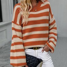 Look beautiful and comfy in the Electra Knitted Sweater! This stripey number is crafted from jersey fabric with a loose fit, long top length, and crew neck, so you can be sure to look stylish and keep cozy at the same time. The long sleeves are made from acrylic so you don't have to worry about cold nights! Get your stripes on and stay warm in Electra! Specs: Material: Acrylic Striped Knit Long Sleeve Sweater, Striped Long Sleeve Knit Sweater, Oversized Textured Knit Crew Neck Top, Oversized Textured Knit Top With Crew Neck, Oversized Cotton Knit Top For Fall, Oversized Knit Top For Fall, Casual Knit Top With Ribbed Cuffs For Fall, Oversized Ribbed Knit Top For Fall, Fall Striped Soft Knit Sweater