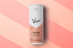 a can of vgai palona on a pink and orange striped wallpaper