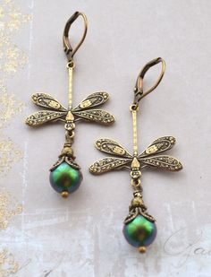 Elegant Green Dragonfly Shaped Jewelry, Vintage Drop Earrings With Antique Finish, Vintage Antique Finish Drop Earrings, Vintage Dangle Earrings With Antique Finish, Vintage Antique Gold Earrings With Ear Wire, Vintage Earrings With Antique Finish For Gift, Antique Finish Vintage Earrings, Vintage Handmade Dragonfly Jewelry, Vintage Antique Gold Earrings For Gift