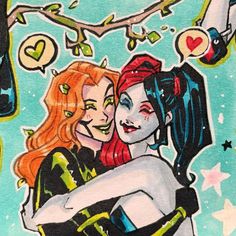 two women hugging each other in front of a tree with hearts and stars on it