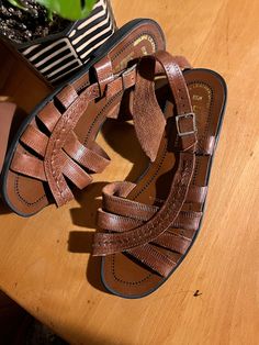 These boho chic strappy sandals are made from genuine leather in a warm brown colour with black rubber soles. They buckle around the heel and have a slight heel. Label: Diffusion (made in Brazil) Size: 6.5  Measurements: Heal to toe - 9.25" Widest part of foot - 3.4" Great vintage condition - normal signs of wear Feel free to message me for more measurements, pictures, or to ask any other questions you might have! Please see my shop policies regarding shipping. Standard shipping does not include Sling Back Sandals, Back Sandals, Brown Colour, Warm Brown, Sling Back, Black Rubber, Strappy Sandals, Shop Policies, Women's Shoes Sandals