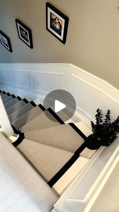 the stairs in this house are decorated with black and white decor