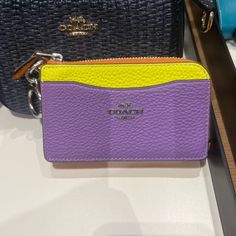 Coach Multifunction Card Case In Colorblock Brand New With Tags Limited Color! Color: Sv/Iris Multi Product Details Refined Pebble Leather Inside Open Pocket Zip Closure Five Credit Card Slots Attached Hinged Key Ring 4 3/4" (L) X 2 3/4" (H) X 3/4" (W) Style No. Cl680 Yellow Wallets With Rfid Blocking For Daily Use, Yellow Rectangular Wallet With Rfid Blocking, Multicolor Wallets With Interior Card Slots, Rfid-blocking Coach Card Holder, Multicolor Wallet With Card Slots, Signature Picture Frame, Coach Multicolor Travel Wristlet, Coach Multicolor Wristlet, Disney Evil Queen