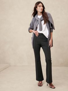 This flare-leg pant is designed for comfort, cut from our Everywhere Ponte fabric.   We developed this special Ponte de Roma, enhancing its softness with special stretch fibers that create a smooth, supportive fit that always looks polished.   4-way Stretch Flare Fit: High-rise (10").  Slim through the hip and thigh with a flared leg.  Full length.  Sustainability: Made with Birla Livaeco™ viscose, a fiber derived from renewable wood resources and sourced from responsibly managed forests.  Birla Livaeco™ viscose is manufactured using a stringent closed-loop process that significantly reduces carbon emissions and water consumption as compared to generic viscose.  Pull-on design with concealed elastic at the waist.  No pockets.  Pin-tuck stitch detail creates the look of a trouser crease.  U Ponte Fabric, Petite Shorts, Grey Trousers, Ponte Pants, Flare Leg Pants, Bottom Clothes, Charcoal Grey, Bottoms Pants, Full Length