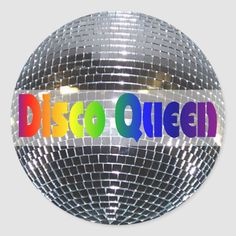 a disco ball with the word disco queen on it in multicolored letters, against a white background