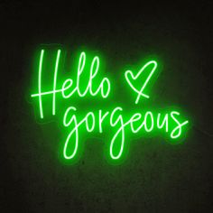 a neon sign that says hello and gorgeous