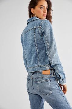 A classic wardrobe staple, this simple denim jacket is the perfect layer for the season. Exposed front pockets and hidden side pockets Simple button closures Machine Wash Cold Import Measurements for size small Bust: 38 in Length: 21 in Sleeve Length: 25.5 in Lightweight Denim Jacket, Classic Wardrobe Staples, Classic Wardrobe, Free People Denim, Denim Details, Faux Leather Skirt, Clothing Co, Dressed Down, Cropped Hoodie