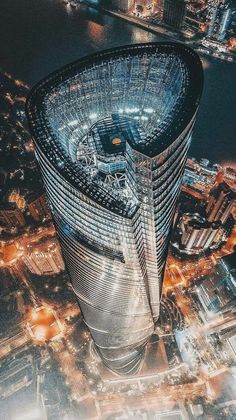 an aerial view of a skyscraper at night