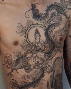 a man with a dragon tattoo on his chest