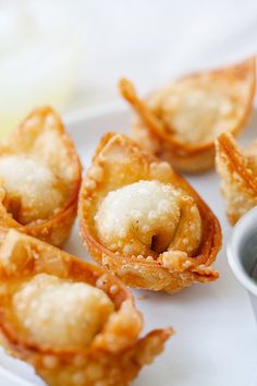 several small pastries on a white plate