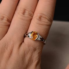 This is a gorgeous handmade creation. Its beauty is its simplicity & Elegance. The 6*8mm oval shape faceted natural citrine is crafted in solid sterling silver and with rhodium plated. All item is sent in a beautiful gift box If you have any idea of design your ring,pls contact me directly. You can realize more lovely stuff clicking the link https://www.etsy.com/shop/knightjewelry?refshopsection_shophome_leftnav Please leave the correct address and you phone number for delivering successfull White Gold Citrine Birthstone Ring With Gemstone, Oval Yellow Sapphire Birthstone Jewelry, Yellow Sapphire Oval Birthstone Jewelry, Oval Citrine Birthstone Jewelry, Oval Yellow Sapphire Jewelry With Polished Finish, Oval Citrine Birthstone Ring For Anniversary, Oval Citrine Birthstone Ring, Oval Yellow Citrine Birthstone Ring, Yellow Sapphire Oval Promise Ring