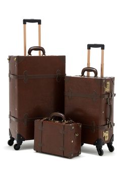 Inspired by the greatest period of traveling, the roaring 1920s, Cotrunkage’s handcrafted minimalism vintage luggage set features a dense wrap-around pu body that is complemented by heavy-duty corned stitching for maximum protection. The soft handle is plush to the touch and wears handsomely over time as the bronze TSA locks lighten with every adventure. We’ve also woven art print lining across the entire bag for a touch of detail and chic flair to sharpen your look. So prepare to boast a timele Suitcase For Women, Roaring 1920s, 3 Piece Luggage Set, Suitcase Set, Vintage Suitcase, Vintage Luggage, Carry On Suitcase, Train Case, Caramel Brown