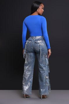 50% Cotton, 27% Polyester, 21% Viscose, 2% Spandex | Inseam: 33" | Model Wearing A Size Medium | Runs True To Size Expect mass hysteria when you step out in these stunning jeans, featuring a high-rise waist with belt loops, zippered closure, and wide cargo leg fit in silver metallic denim with multiple cargo pockets throughout. Luxury High-waist Denim Blue Cargo Jeans, Luxury Dark Wash Cargo Jeans With Hip Pockets, Luxury High Waist Rigid Denim Cargo Jeans, Luxury Medium Wash Cargo Jeans With Patch Pockets, Luxury Medium Wash Cargo Jeans For Streetwear, Luxury Medium Wash Cargo Jeans With Side Pockets, Luxury High Waist Cargo Jeans For Women, Luxury Blue Cargo Jeans With Patch Pockets, Luxury Medium Wash Cargo Jeans With Five Pockets