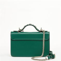 Upgrade your style with our green leather bag crossbody, a perfect fusion of functionality and elegance. This green leather purse offers a versatile design, seamlessly transitioning from casual outings to formal occasions. Whether you're looking for a green crossbody bag or a sleek green leather shoulder bag, this piece adapts to your needs effortlessly. Crafted from premium materials, this leather crossbody bag boasts durability and sophistication. Its rich, dark green leather bag finish adds a Luxury Green Crossbody Satchel, Green Trendy Flap Bag For Formal Occasions, Trendy Green Flap Bag For Formal Occasions, Green Shoulder Bag With Palladium Hardware For Everyday, Green Leather Shoulder Flap Bag, Green Leather Shoulder Bag For Evening, Green Rectangular Satchel With Silver-tone Hardware, Elegant Green Satchel With Chain Strap, Evening Green Leather Shoulder Bag