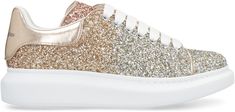 Elevate your street style with these 'Oversize' sneakers from Alexander McQueen. The DÃ©gradÃ© glitter embellished upper and laminated nappa leather spoiler make a bold statement, while the contrasting printed lettering logo adds a touch of luxury. The silver-tone metal eyelets and leather trims give these sneakers a high-end finish, while the leather interior and removable insole ensure maximum comfort. Complete with a rubber sole and supplied with spare laces, these sneakers are the perfect co Lettering Logo, Versace Bags, Birkin 25, Lv Bag, Fendi Bags, Nappa Leather, Leather Interior, Prada Bag, Watch Brands