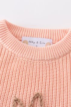 Hop into style with our Coral Hand-Embroidery Bunny Pullover Sweater. This playful top features a cute bunny design hand-embroidered on a soft coral fabric. Perfect for adding a touch of whimsy to any outfit. (Hoppin' good fun without compromising on style!) 100%COTTON 700056 Cute Long Sleeve Knitted Top, Cute Cotton Soft Knit Sweater, Cute Long Sleeve Soft Knit Tops, Playful Pink Crew Neck Sweater, Playful Knitted Crew Neck Top, Playful Pink Cotton Sweater, Cute Crew Neck Sweater With Ribbed Cuffs, Cute Long Sleeve Orange Top, Pink Crew Neck Top With Bunny Design