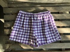 Purple Plaid Shorts. Great to wear for your next festival. Super cute summer shorts. Super cute and really comfy shorts. Made from cotton shirting with an elastic waist band. Great gift for a birthday, holiday or even a treat for yourself. All of my shorts are made to order so if you have a special request you can leave me a note with your order telling me your exact size specifications. If you don't see your size, if you need the shorts bigger or smaller just tell me and I can make it whatever Cute Summer Shorts, Gingham Shorts, Festival Shorts, Black And White Shorts, Purple Plaid, Lightweight Shorts, Shorts Summer, Trendy Shorts, Comfy Shorts