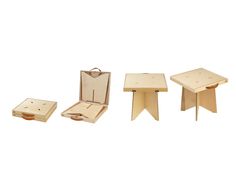 three small wooden tables and stools with one open box on the table, another closed