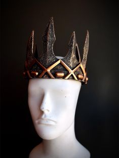 medieval crown in quality foam type base that's lightweight but strong and custom painted to any color or select in bronze C U S T O M I Z A T I O N Can be customized further. Get in touch for custom orders! S I Z E  Adult size only. S H I P P I N G -  Processed same day or within 24 hours.  1-2 day guaranteed delivery, add item to cart, click shipping tab for rates.  Pls leave a check out note with your need date & contact number  Msg for delivery time frames (Include your state/country) C O N T A C T  Please contact us via ETSY messages. P H O T O  Images displayed on this listing are property of www.higginscreek.com A B O U T HigginsCreek makes elegant and fun photography props for adults and children for all special occasions.   Thank you in advance for your order and support! Medieval King, Cosplay Crown, Medieval Crown, Regal Elegance, Crown Gold, Female Mask, Costume Parties, Themed Events, Black Mask