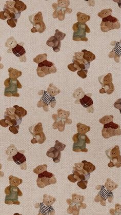 a white fabric with teddy bears on it