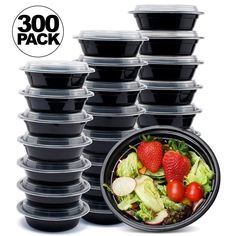 a bunch of black plastic bowls with strawberries and lettuce in them on a white background