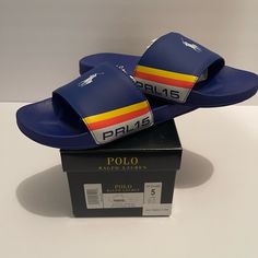 Royal Blue Never Worn Polo Slides. Blue Open Toe Slides With Rubber Sole, Blue Rubber Sole Slides Slip-on, Blue Slip-on Slides With Rubber Sole, Blue Cushioned Slip-on Slides, Blue Slides With Branded Insole And Round Toe, Blue Synthetic Slides With Rubber Sole, Sporty Blue Slide Sandals, Comfortable Blue Sandals With Rubber Sole, Casual Blue Slide Sandals