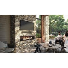 two people sitting on chairs in front of a fireplace with a flat screen tv above it