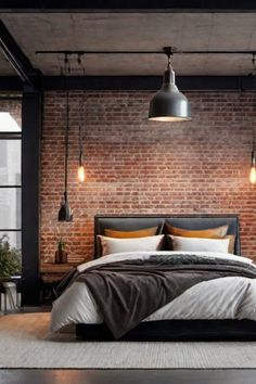 Modern bedroom with exposed brick wall, industrial pendant lights, and a neatly made bed with neutral tones. Industrial Style Interior Design Bedroom, Feminine Industrial Bedroom, Industrial Boho Bedroom, Industrial Chic Bedroom, Bedroom Ideas Industrial, Industrial Interior Design Bedroom, Rustic Industrial Bedroom, Industrial Bedroom Ideas, Bedroom Industrial Chic