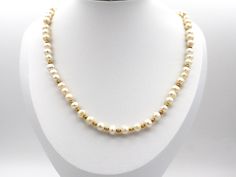 Pearl necklace jewelry.  Bride and bridesmaid Pearl and gold filled bead necklace.  Handmade pearl and gold necklace jewelry.  Anniversary, birthday and graduation jewelry.  An ideal gift for her. MATERIALS AND SIZE 6-7mm white pearl beads 3mm gold filled beads 6mm gold filled jump rings gold filled lobster claw claps Necklace measures 21 inches long This necklace is fit for every occasion. Yellow Gold Single Strand Pearl Necklace For Wedding, Gold Single Strand Pearl Necklace For Wedding, Gold Beaded Necklace With Pearl Chain For Anniversary, Gold Pearl Beaded Necklaces For Anniversary, Gold Beaded Pearl Chain Necklace For Anniversary, Classic Gold Beaded Necklaces For Wedding, Gold Bridal Necklace With Round Beads For Anniversary, Pearl And Gold Necklace, Bridesmaid Pearl Necklace