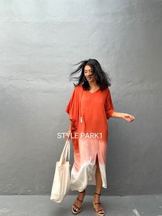 Flowy V-neck Kaftan For Day Out, Orange V-neck Summer Beach Dress, Bohemian V-neck Maxi Dress With Side Slits, Orange V-neck Maxi Dress For Beach, Summer V-neck Kaftan For Beach Season, Casual Orange Poolside Dress, Free Size V-neck Maxi Dress For Beachwear, Chic Free Size Beach Kaftan, Chic Free Size Kaftan For Beach