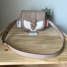 100% Authentic Coach C3596 Multi Colorblock George Saddle Bag Taupe Multi And Gold Hardware **New With Tags** Approximate Measurements: 8" (L) X 7" (H) X 3" (D) Adjustable And Detachable Strap For Crossbody Or Shoulder Wear Trendy Beige Bag With Branded Hardware, Beige Satchel With Branded Hardware For Daily Use, Beige Flap Shoulder Bag With Branded Hardware, Chic Beige Coach Shoulder Bag, Beige Shoulder Flap Bag With Branded Hardware, Chic Beige Coach Satchel, Coach Beige Shoulder Bag With Gold-tone Hardware, Beige Coach Shoulder Bag, Beige Crossbody Satchel With Branded Hardware