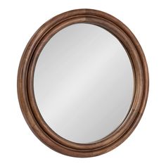 a round wooden mirror on a white background