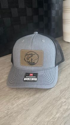 This is our awesome fly-fishing patch on our Premium Classic 6 panel structured snapback trucker hats. Snapback that fits most.  This high quality hats are the highest quality in the industry! Your Fisherman will love this! Gray Outdoor Hat With Logo Patch, Trucker Baseball Cap With Curved Bill For Fishing, Trucker Baseball Cap For Fishing With Curved Bill, Outdoor Trucker Hat With Logo Patch For Baseball Season, Fishing Trucker Cap With Curved Bill, Outdoor Baseball Season Hat With Logo Patch, Trucker Snapback Hat For Fishing, Trucker Snapback Hat With Curved Bill For Fishing, Trucker Hat With Flat Bill For Fishing