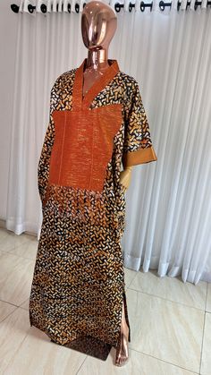 This Adire Ankara Silk Kaftan maxi dress is made with Polysilk. It can be styled in different ways, you can dress it up with high heels or dress down with flats/sneakers. The Hand can be worn in 2 ways. one ways shows off the arm, the 2nd way has the arm covered for modesty. Notice the slits.Other prints are also available, kindly start a conversation to ask for more information and pics.Contact us for custom looks and more style options. Sizing 🌺 Your height or desired kaftan length is needed. The Slits, Kaftan Maxi Dress, Cotton Kaftan, Silk Kaftan, Orange Orange, Flat Sneakers, 2 Way, Dressed Down, Ankara