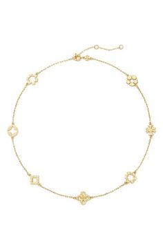 Accessorize in artistic style with this delicate chain necklace plated in 18-karat gold and featuring different styles of clover stations. 16" length; 1 3/4" extender 1/2"W x 1/2"L pendant Goldtone plate/enamel Imported Necklace Gold Simple, Tory Burch Necklace, Wag Dr, Thrift Inspo, Tory Burch Kira, Gold Necklace Simple, Designer Necklace, Artistic Style, Tory Burch Miller