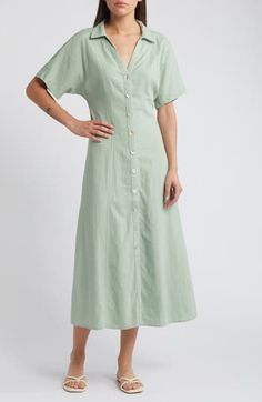 Coming in an airy linen woven with Lenzing™ EcoVero™ viscose, this shirtdress has a point collar and oversized short sleeves. Designed with a body-skimming fit, this midi has buttons along the front for easy on-and-off. 50 1/2" length (size 8) Front button closure Point collar Short sleeves Unlined 55% linen, 45% Lenzing™ EcoVero™ viscose Lenzing™ EcoVero™ viscose is a sustainably produced fiber using pulp made from renewable wood sources and certified with the EU Ecolabel for high environmental Spring Collared Linen Dress With Relaxed Fit, Collared Linen Dress For Spring Daywear, Spring Green Linen Daywear Dress, Green Linen Spring Dress For Daywear, Spring Green Linen Dress For Daywear, Summer Shirt Dress With Relaxed Fit And Collared Neckline, Summer Shirt Dress With Collared Neckline, Relaxed Fit Shirt Dress With Collared Neckline For Summer, Relaxed Fit Collared Shirt Dress For Summer