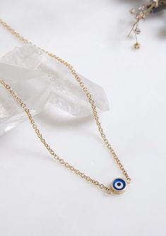 14K SOLID YELLOW GOLD EVIL EYE NECKLACE Here is a dainty, delicate and simple, yet classy minimalist Evil Eye Necklace . This is 14k Solid Yellow Gold. ( We do not sell filled or plated jewelry) Perfect for everyday use. -PRODUCT DETAILS - Metal : 14K SOLID GOLD Necklace Length : 17.5 Inches / 43.75cm Pendant Height : 4.65mm Pendant Width : 4.65mm Shipping Policy Item will be shipped within 1-3 business days of receiving full payment. Return Policy -You may return the unused item in its original 14k Gold Filled Evil Eye Jewelry, Elegant 14k Gold-filled Evil Eye Jewelry, Minimalist Gold Evil Eye Jewelry, Gold Dainty Jewelry With Evil Eye, Gold Evil Eye Dainty Jewelry, Elegant Gold Evil Eye Necklaces, Dainty Gold Evil Eye Jewelry, Dainty Yellow Gold Evil Eye Necklace, Elegant Gold Evil Eye Necklace