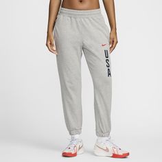 Don't let a little chill come between you and your country. These soft, sweat-wicking pants show your pride for USA with squad graphics on cozy fleece. Nike Cotton Sweatpants For Sports Season, Nike Cotton Sweatpants, Nike Cotton Pants With Moisture-wicking, Practice Basketball, Nike Basketball, Womens Basketball, Fleece Pants, Pocket Bag, Nike Dri Fit