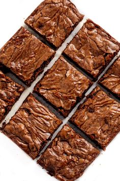 chocolate brownies cut into squares on top of each other