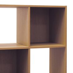 an empty wooden shelf with three shelves on each side and no one in the room