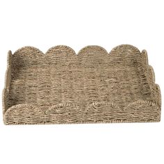 a wicker tray with scalloped edges