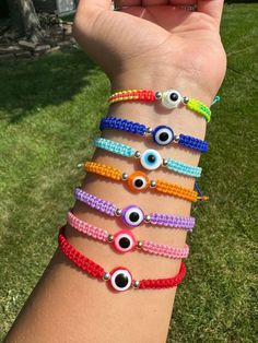 Adjustable evil eye bracelet. Available in 9 colors (price per bracelet) Trendy Adjustable Evil Eye Friendship Bracelets, Trendy Evil Eye Bracelet For Friendship, Trendy Resizable Evil Eye Bracelet, Adjustable Evil Eye Friendship Bracelets, Adjustable Round Evil Eye Bracelet, Trendy Adjustable Multicolor Evil Eye Bracelet, Casual Evil Eye Bracelets, Pink Adjustable Evil Eye Bracelet Trendy, Multicolor Evil Eye Round Bracelets