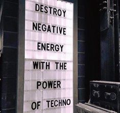 a sign that says destroy negative energy with the power of music on it's side