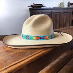 Handmade Beaded hatband tie!Sparkly seed beads where used to create this beautiful cow boy hat accessory. Adjustable Multicolor Hat For Western-themed Events, Handmade Southwestern Blue Hat Band, Traditional Beaded Hat Bands For Rodeo, Handmade Multicolor Hats For Rodeo, Handmade Blue Hat Band For Rodeo, Handmade Blue Hat Bands For Rodeo, Western Blue Hat Bands For Beach, Handmade Multicolor Southwestern Hats, Southwestern Turquoise Hat Bands For Country Events