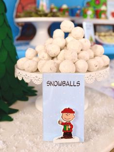 there is a snowball display on the table